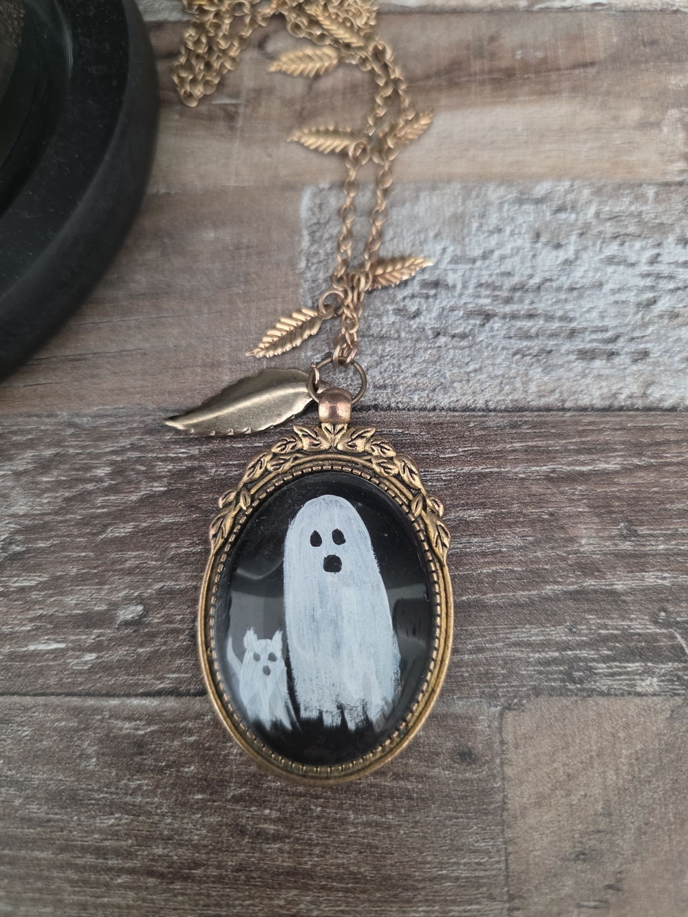 Vintage-Inspired Gold Ghost Pendant Necklace - White on Black